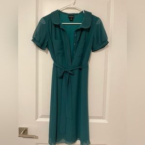 Emerald green knee length dress